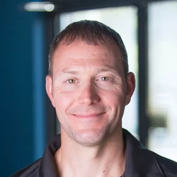 Headshot photo of massage therapist Charlie Wichser